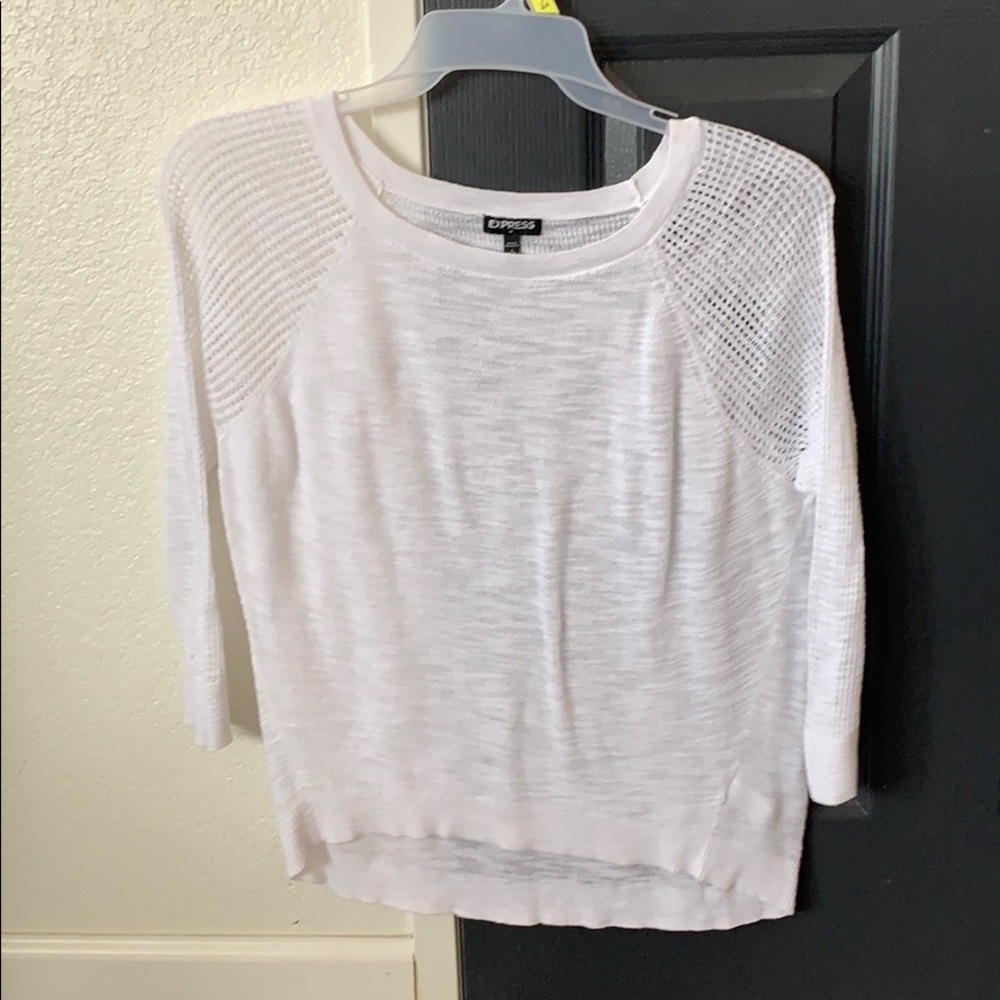 Knit sweater.